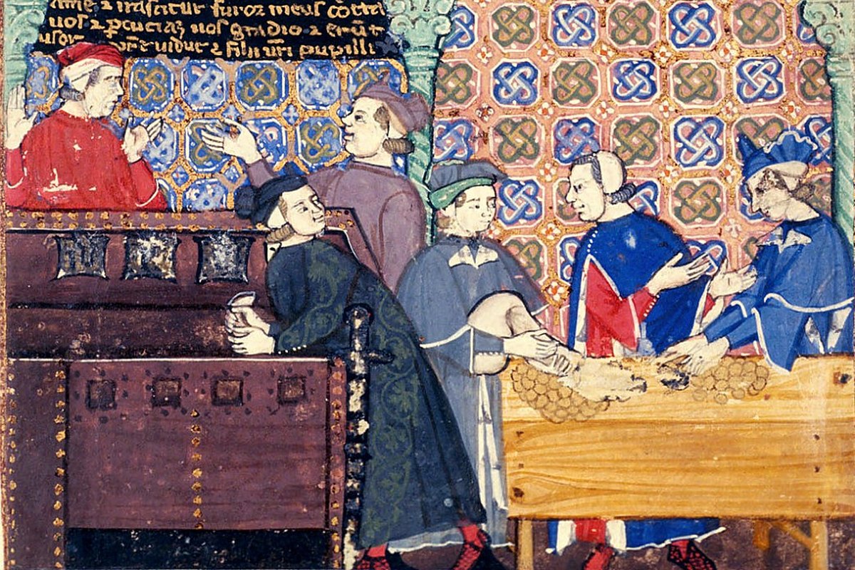 Miniatura medievale: cambiavalute e monete sul banco